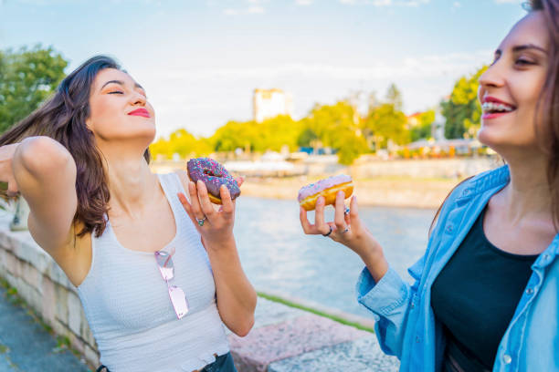 istock Cheerful girlfriends have a good time together 1317671671