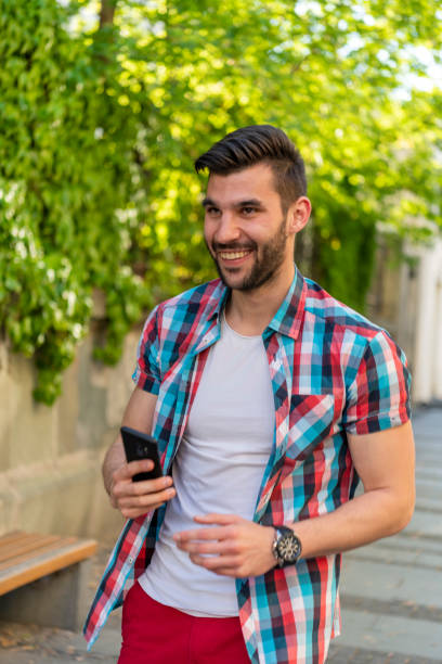 istock Young urban man using smart phone. 1317671681