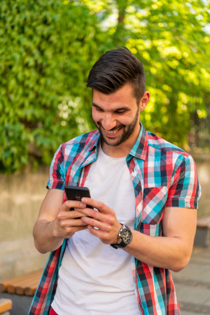 istock Young urban man using smart phone. 1317671718