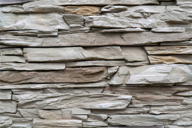 istock White stone wall of a building. 1317672191
