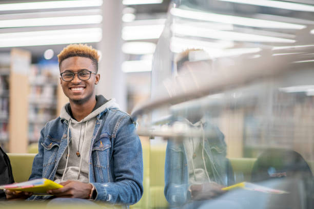 istock Hanging out at the campus library 1317672654