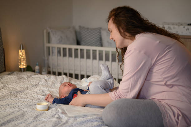 istock Mother playing and bonding with her adorable baby 1317677137