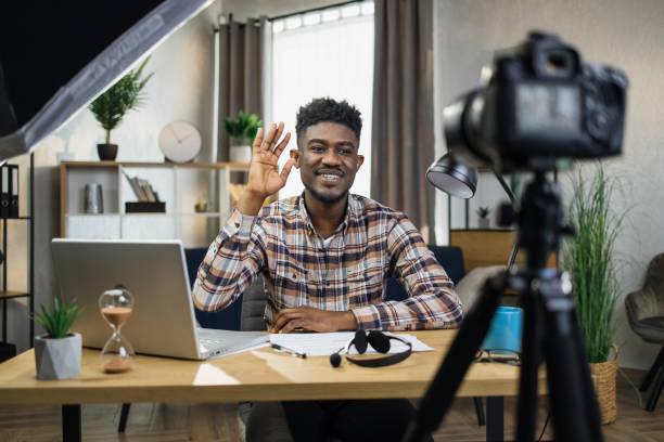 istock African man recording educational seminar on video camera 1317677189