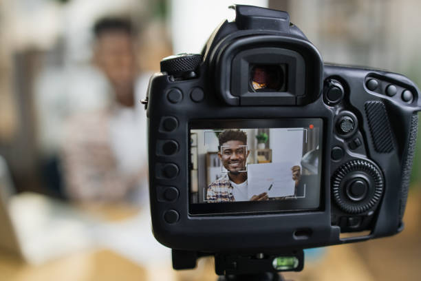 istock Afro-american business coach recording marathon on camera 1317677222