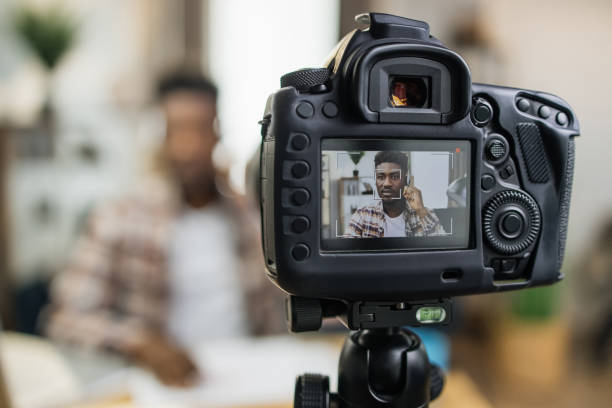 istock African man in headset recording online lesson on camera 1317677236