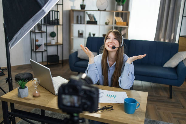 istock Caucasian woman in headset making live broadcast 1317677971