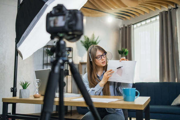 istock Business woman recording masterclass on video camera 1317678053