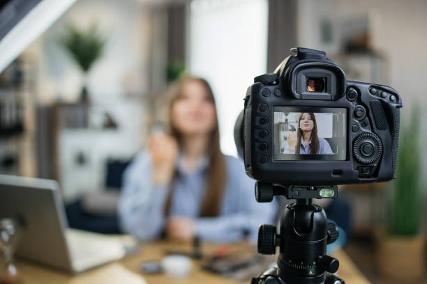 istock Caucasian woman filming tutorial about cosmetics 1317678282
