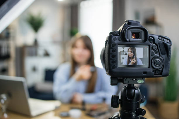 istock Caucasian woman filming tutorial about cosmetics 1317678289