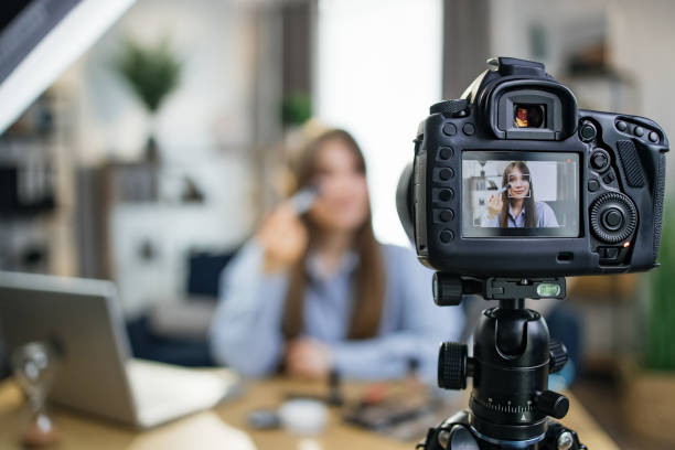 istock Caucasian woman filming tutorial about cosmetics 1317678299