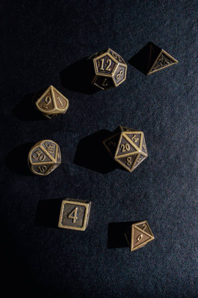 Overhead vertical image of a bronze colored set of Role-playing game dice