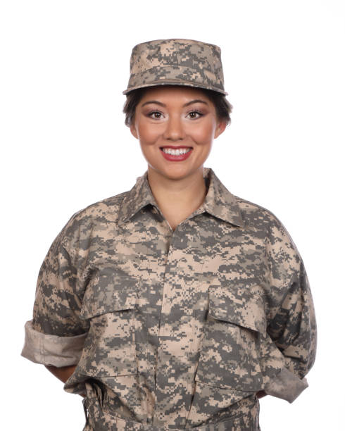 istock Asian Woman Soldier on White Vertical 1317686009