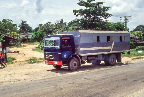 Baracoa, Cuba - aug 2001: trucks, vans and all kinds of vehicles are used for public transport in Cuban rural areas.