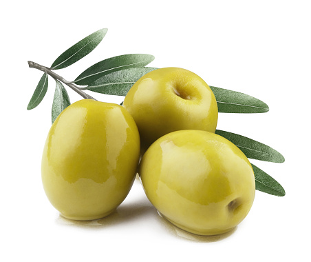 Delicious green olives with leaves on white