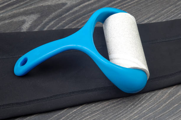 istock sticky plastic roller for cleaning clothes from dust, lint and hair 1317687099