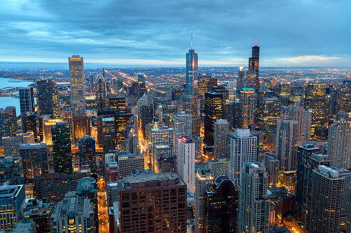 Chicago, Illinois, cityscape illuminated at dusk viewed from above, long exposure.