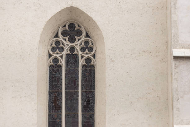 istock Window with stained glass windows on the old church 1317700392