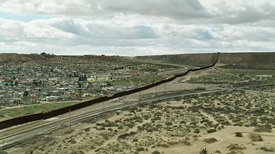Aerial view of the US/Mexico Border Wall separating New Mexico and Chihuahua.