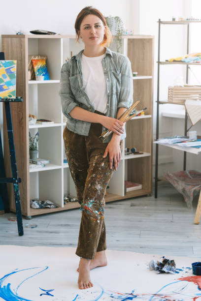 istock art class painter lifestyle female artist studio 1317711739