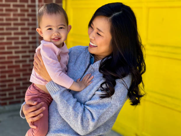 istock Asian Woman and Baby 1317712836