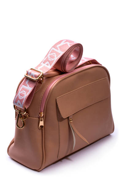 istock Beige Women's handbag on white background 1317719643