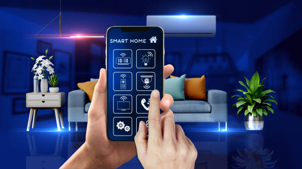 Smart Home Mobile Phone Control It has interior scene with many wireless controlled device and a mobile with app that is controlling them home automation stock pictures, royalty-free photos & images