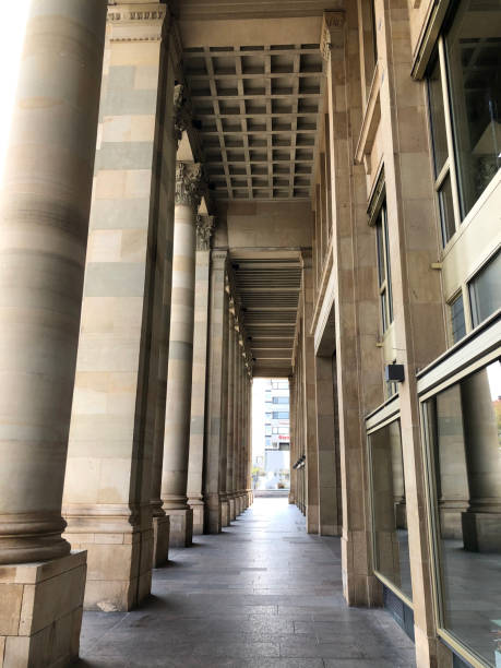 istock Colonade in an old and tall building 1317722079