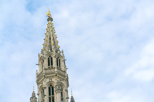 Grote Markt square and Belfort tower in Bruges, Belgium.