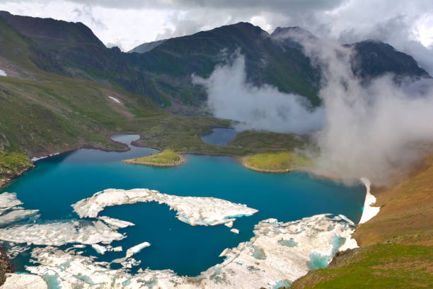 istock mountain lake in a mist 1317728393