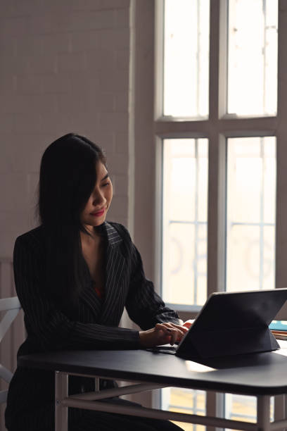 istock Portrait of female entrepreneur concentrate working on computer tablet at modern workplace. 1317731026