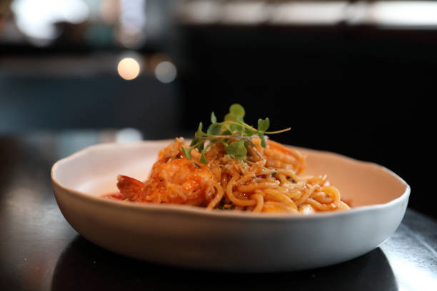 istock spaghetti pomodoro with sea food 1317731262