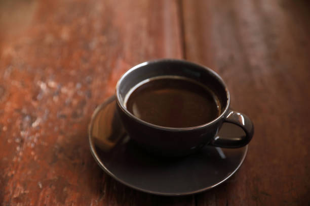 istock Cappuccino coffee break on wood background 1317732043