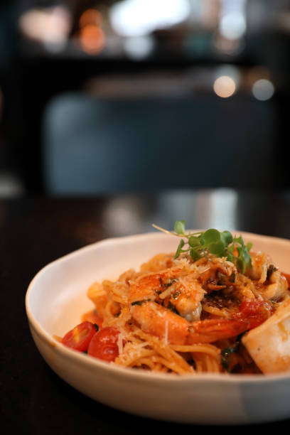istock spaghetti pomodoro with sea food 1317732156