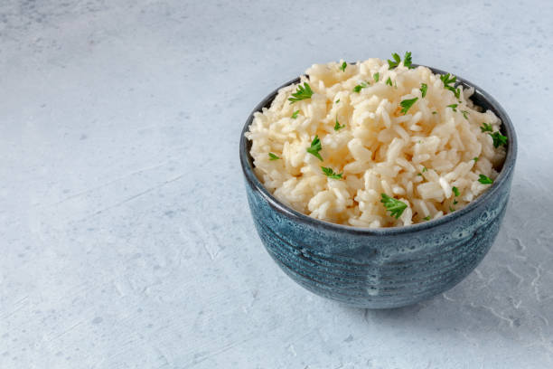 istock White rice in a bowl with copy space 1317733339