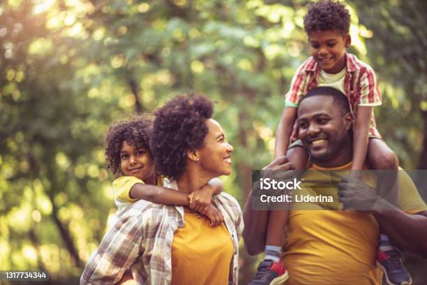 African American family having fun outdoors.