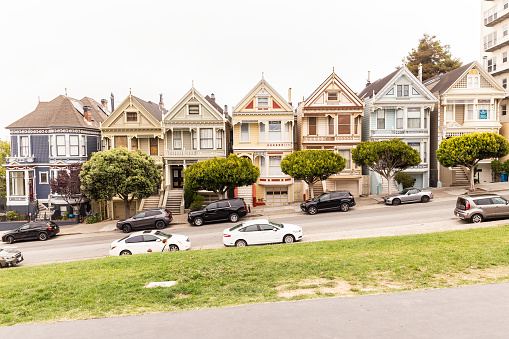 SAN FRANCISCO, CALIFORNIA - July 24, 2018: Beautiful view of Painted Ladies, colorful Victorian houses in a row on a summer day, San Francisco, California, USA