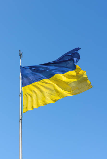 istock Ukrainian flag on a flagpole close up 1317738224