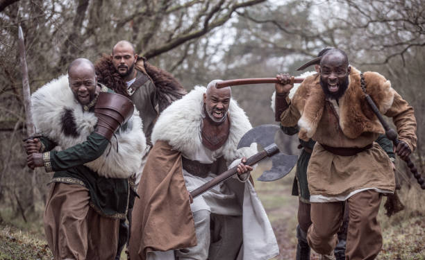 istock Small group of African Warriors in a forest 1317739860