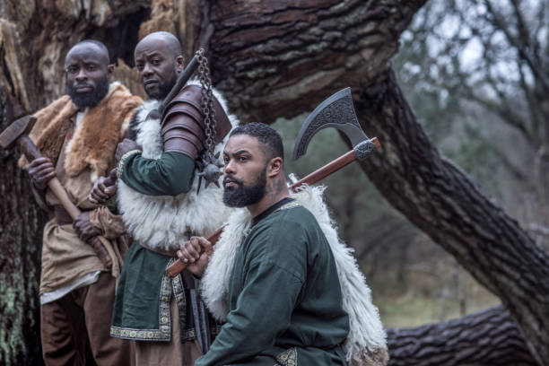 istock Small group of African Warriors in a forest 1317739895