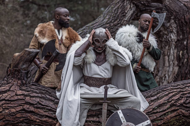 istock Small group of African Warriors in a forest 1317740735