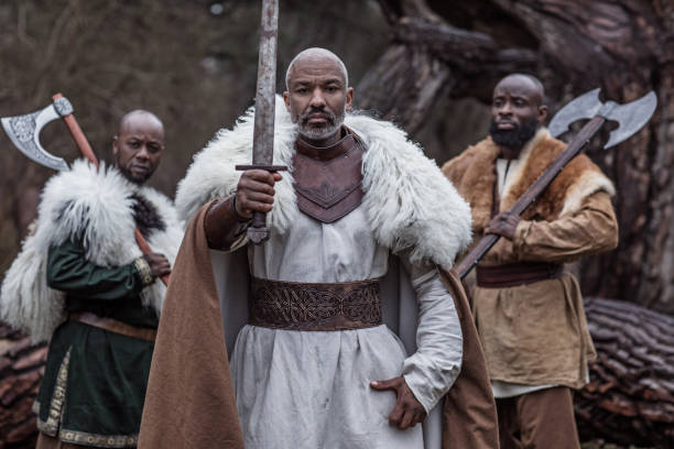 istock Small group of African Warriors in a forest 1317740765