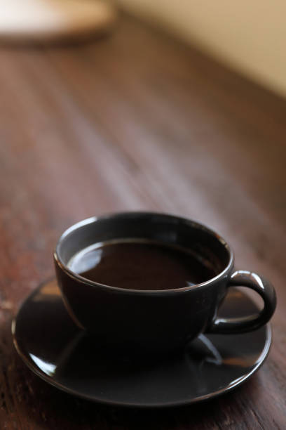 istock Cappuccino coffee break on wood background 1317742567