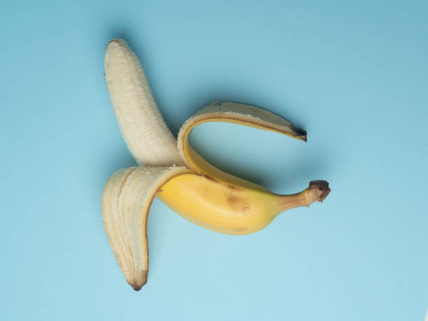 istock Banana. Isolated banana on blue background 1317743834
