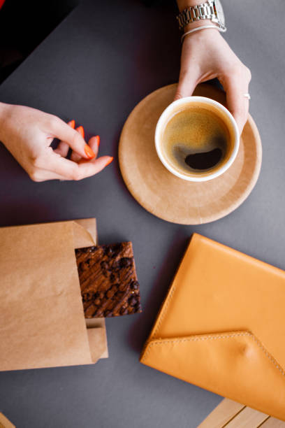 istock Black strong morning coffee in eco paper cups. Freelance work. 1317744228