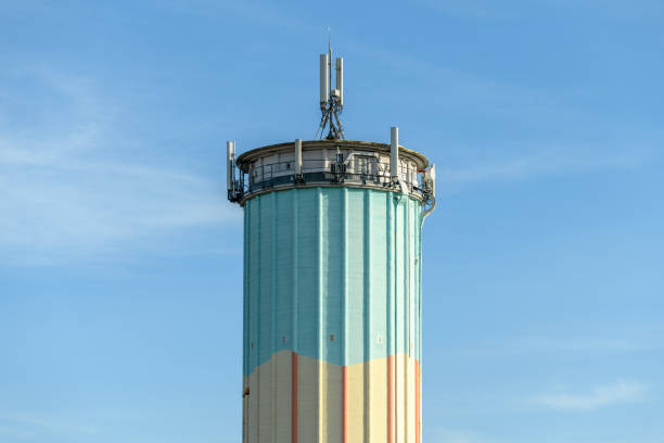 istock Communication antenna on a water tower in the Alsace plain . 1317744501