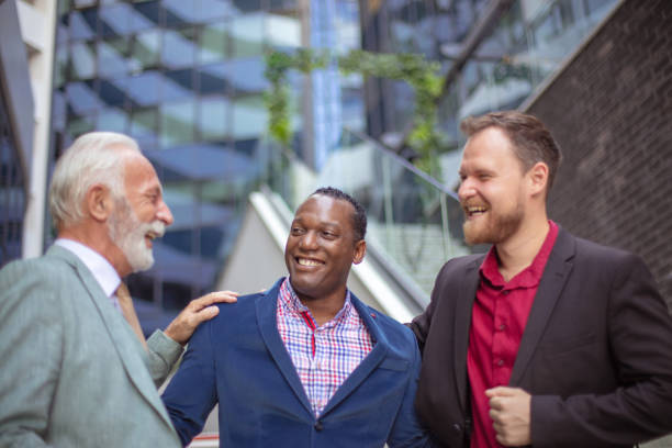 istock Great business team.  Three business men talking. 1317745301