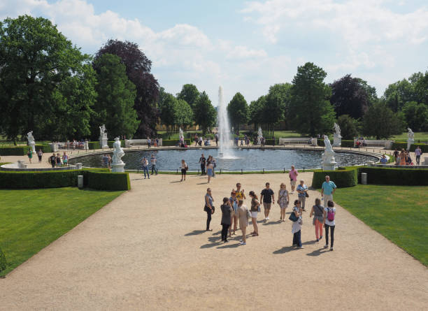 Potsdam, Germany - Circa June 2016: Tourists visiting the Schloss Sanssouci royal summer palace of Frederick the Great King of Prussia