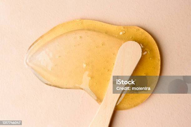Liquid Sugar Wax Smear With Spatula Stock Photo - Download Image Now - Hair Removal, Wax, Waxing - Hair Removal