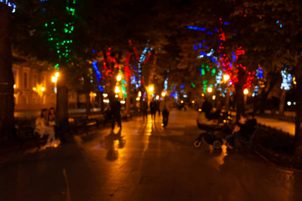 istock Blurred city street in the evening 1317747131