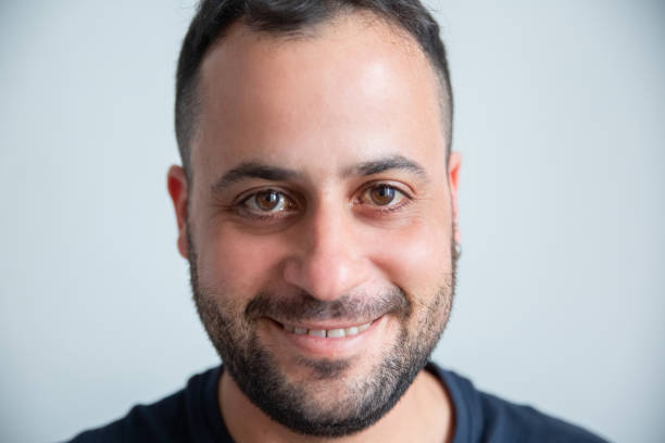istock Close-up of smiling man looking at camera 1317747845